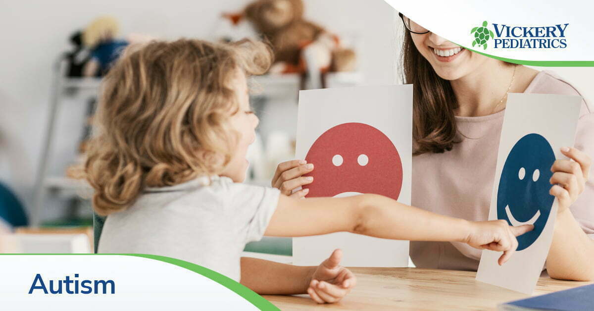 A child being evaluated for autism by a pediatrician
